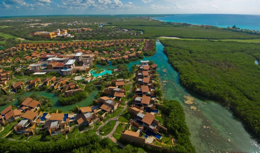 Banyan Tree Mayakoba ultra-luxury villa resort in Riviera Maya with private pools, lagoon setting, and world-renowned spa experiences.