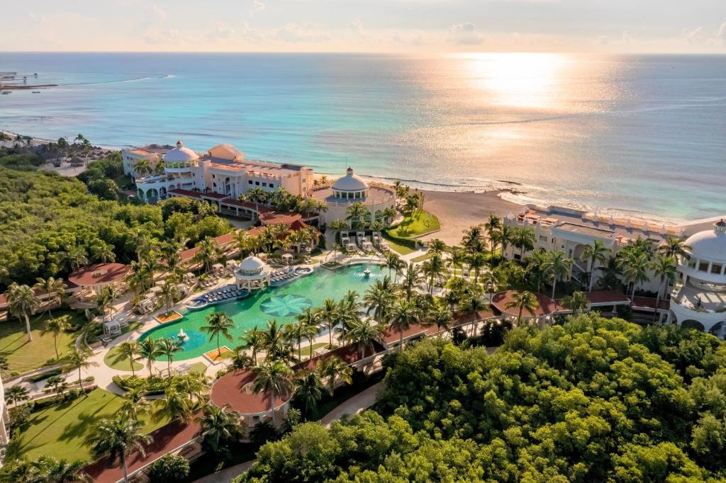 JOIA Paraíso by Iberostar adults-only all-inclusive resort with modern design, beachfront pools, and upscale amenities on the Riviera Maya.