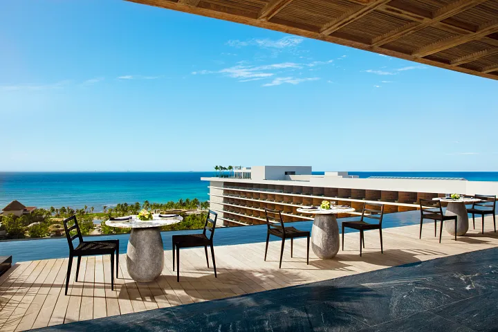 Observatory Preferred Rooftop at Secrets Moxché Playa del Carmen featuring an ocean-view rooftop restaurant terrace overlooking the Caribbean Sea.