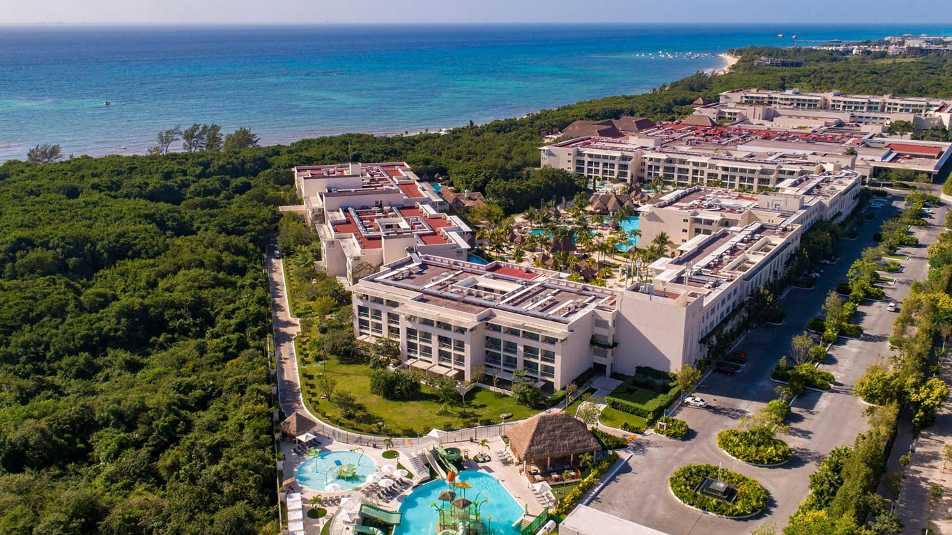 Paradisus Playa del Carmen adults-only luxury all-inclusive resort with beachfront pools, refined suites, and upscale amenities on the Riviera Maya.