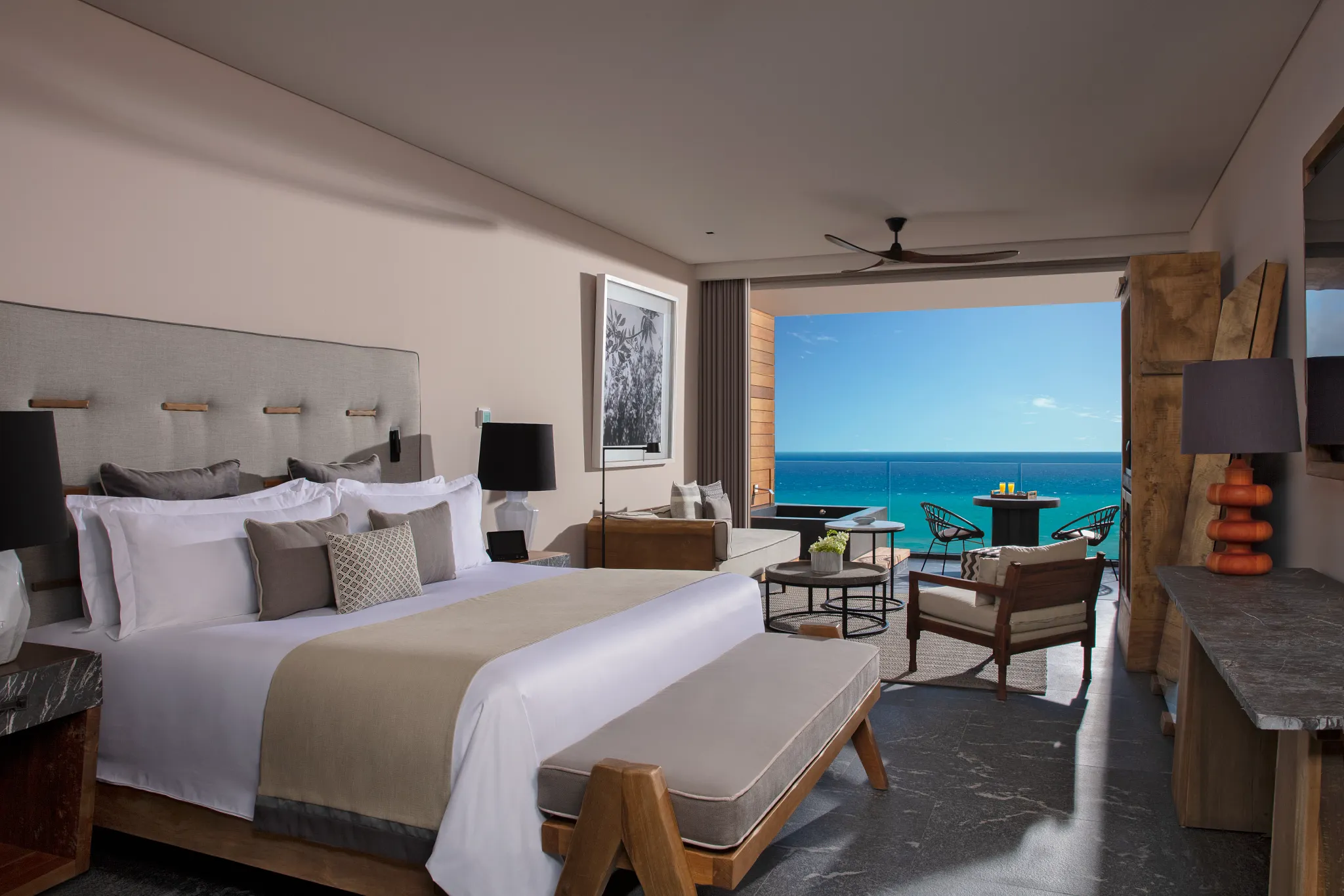 Preferred Club Junior Suite Oceanfront with king bed and private terrace overlooking the Caribbean at Secrets Moxché Playa del Carmen.