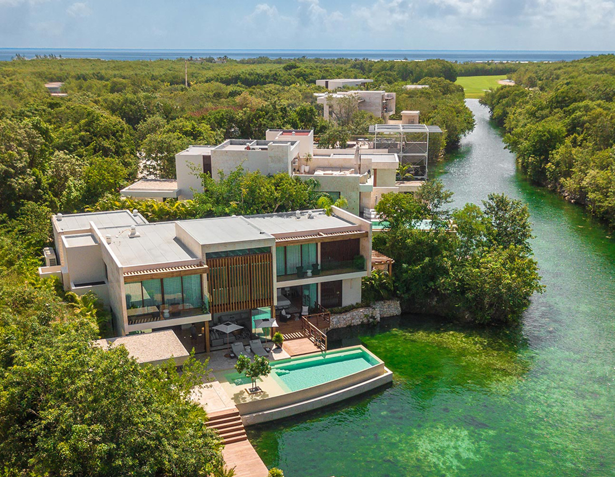 Rosewood Mayakoba ultra-luxury resort with private lagoon suites, lush mangroves, and world-class service in the Riviera Maya, Mexico.