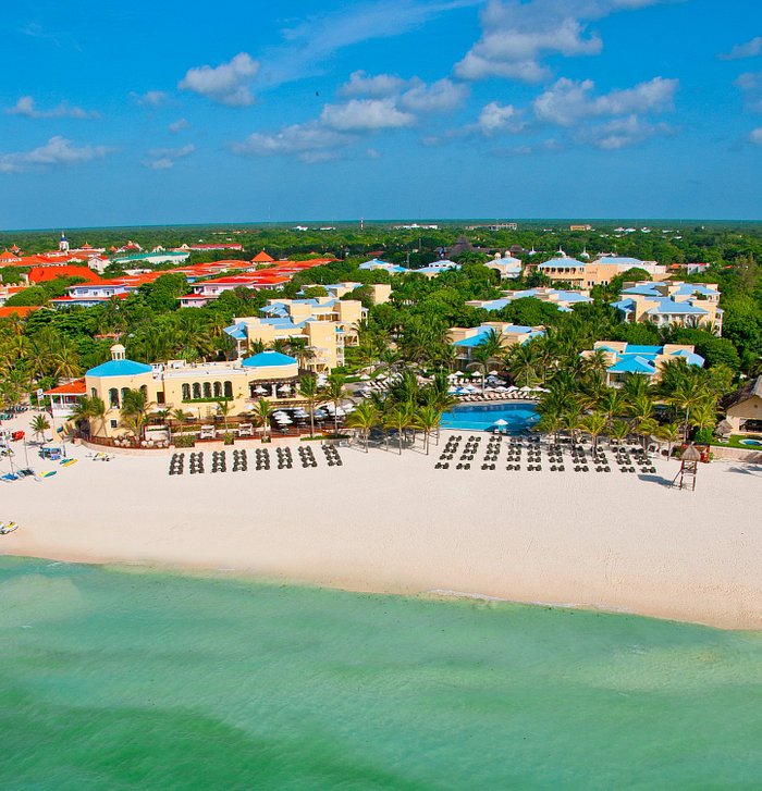 Royal Hideaway Playacar adults-only luxury all-inclusive resort with colonial architecture, manicured gardens, and pristine Playacar beach.