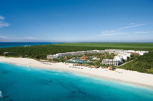 Secrets Maroma Beach Riviera Cancun adults-only luxury all-inclusive resort with pristine white sand beach and tropical elegance.
