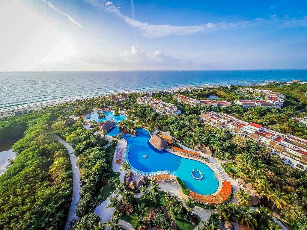 Valentin Imperial Riviera Maya adults-only all-inclusive resort with colonial-style architecture, expansive pools, and beachfront setting in the Riviera Maya.